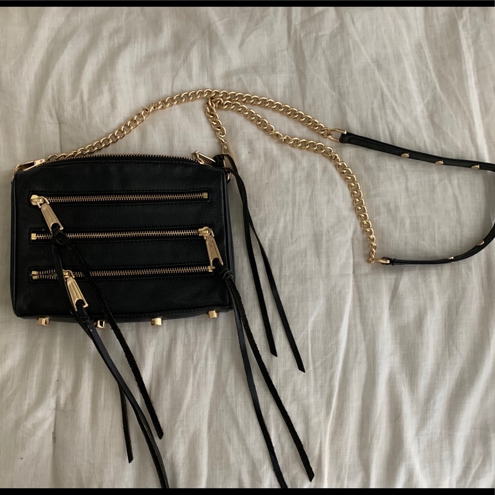 Black Rebecca Minkoff mini mac with gold detailing